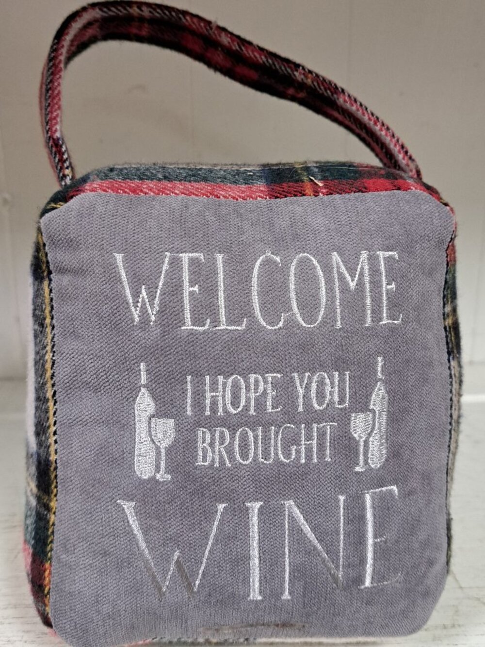 PLAID WELCOME I HOPE YOU BOUGHT WINE DOORSTOP BAG W HANDLE